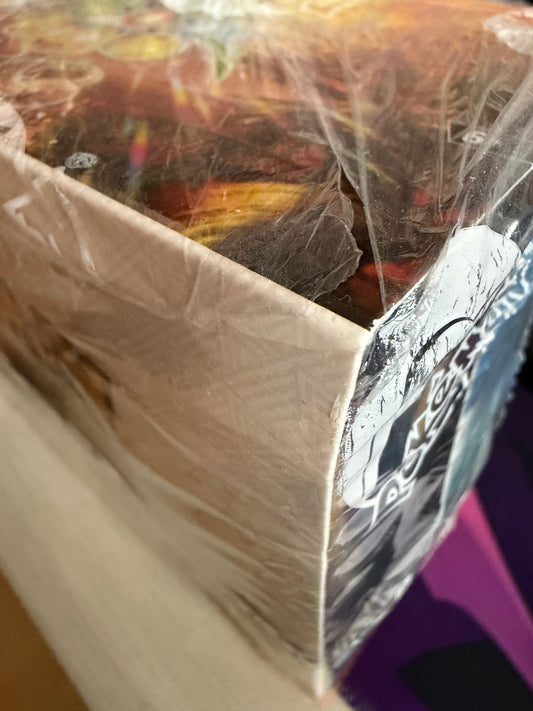 Booster Box 36 sobres Surging Sparks ,Ingles, roturas en el sellado.( Ideal para abrir)