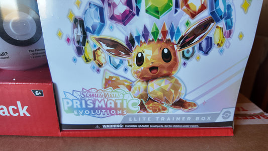 ETB Prismatic Evolutions + Ultra ball ( el de la imagen ) , exclusive USA , Ingles
