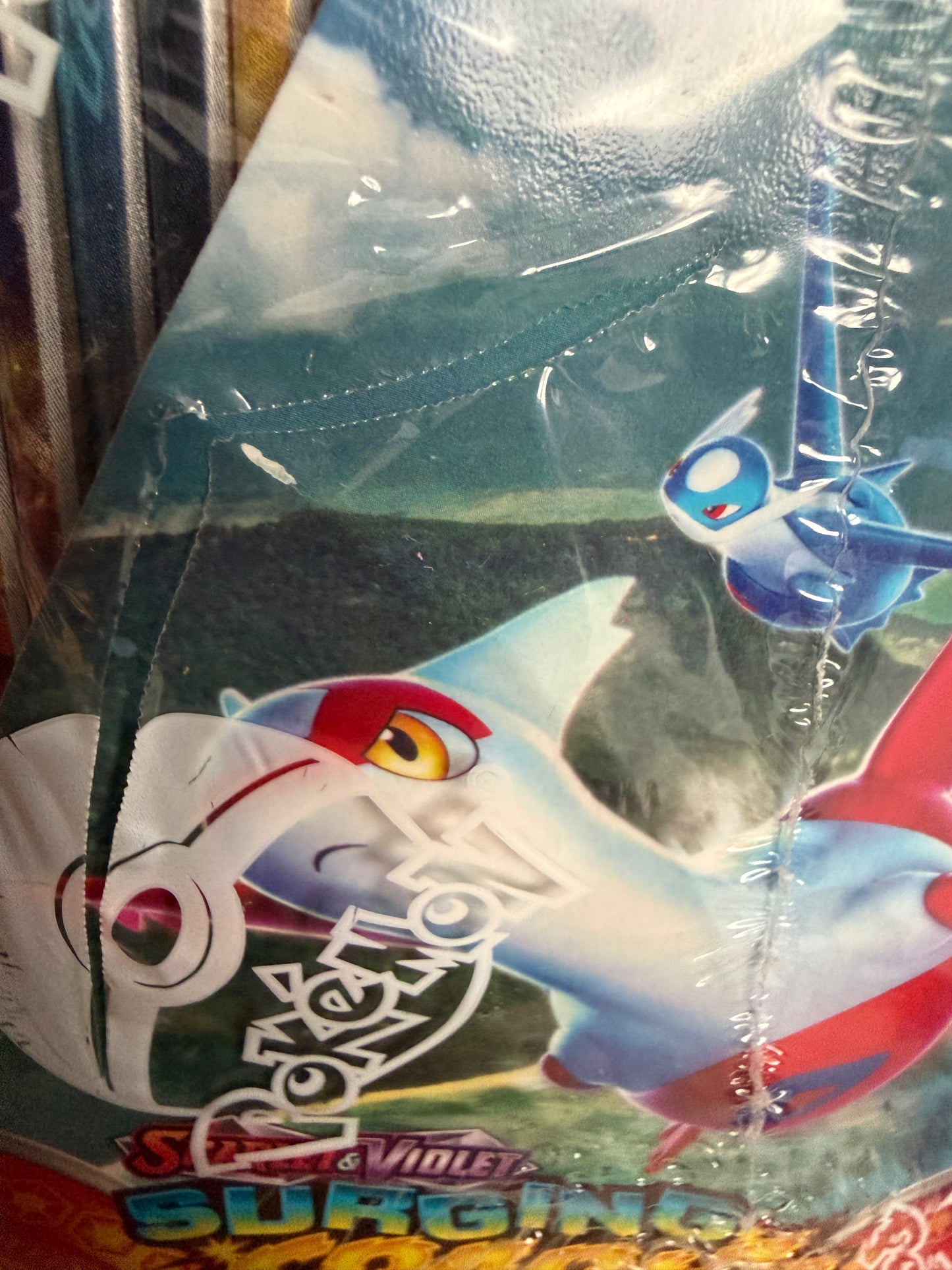 Booster Box 36 sobres Surging Sparks ,Ingles, roturas en el sellado.( Ideal para abrir)
