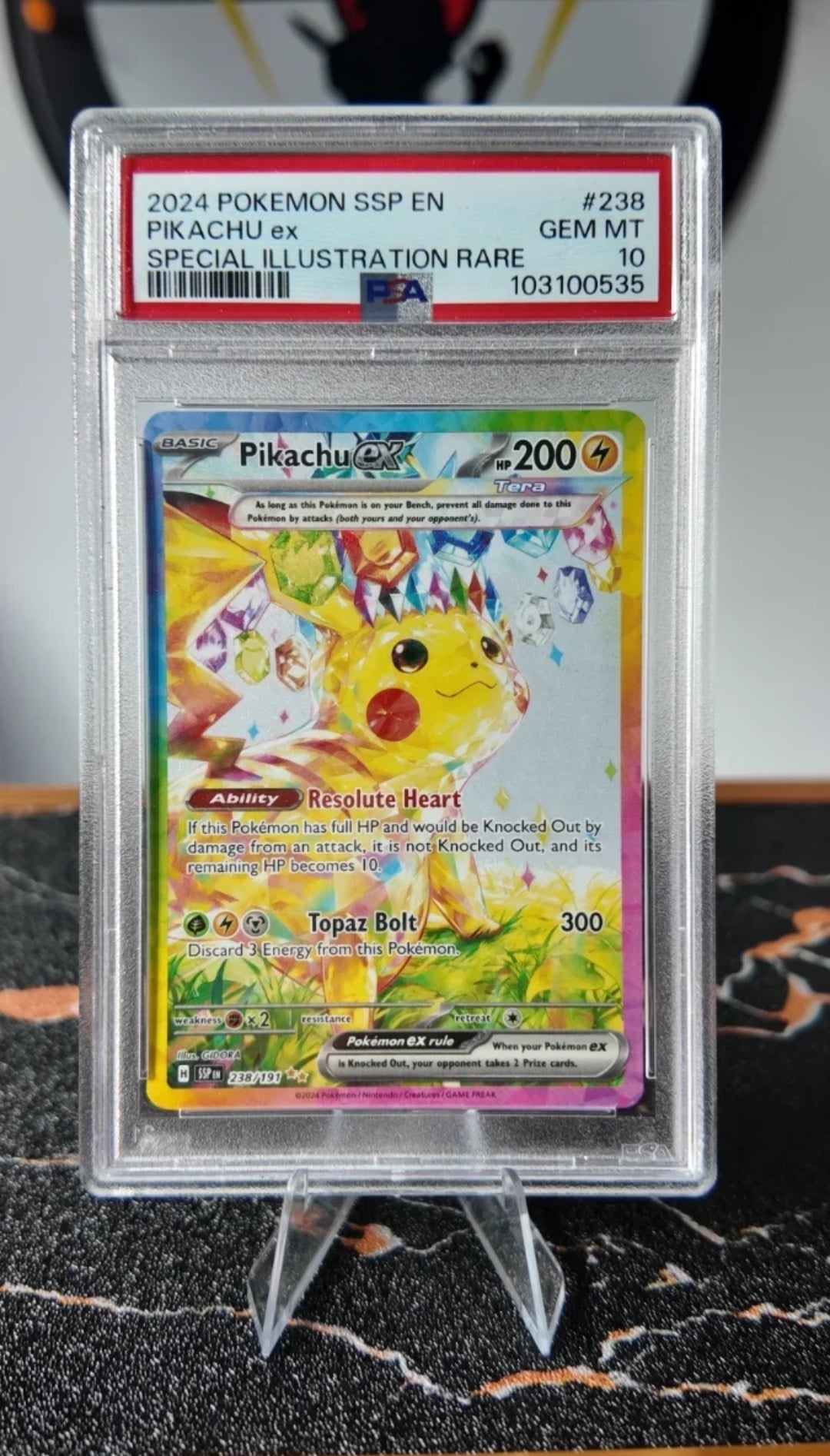Pikachu Surging Sparks , PSA 10 , Ingles