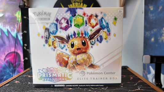 ETB Prismatic Evolutions , Pokémon Center.(Única unidad)
