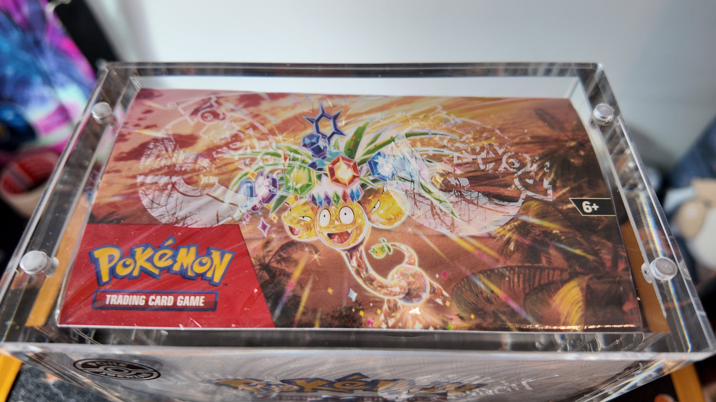 Booster Box 36 sobres Surging Sparks , Inglés, incluye protector acrílico .