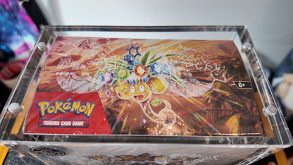 Booster Box 36 sobres Surging Sparks , Inglés, incluye protector acrílico .